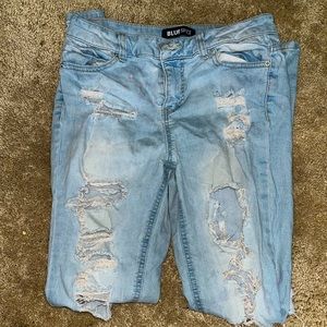 Light blue ripped jeans
